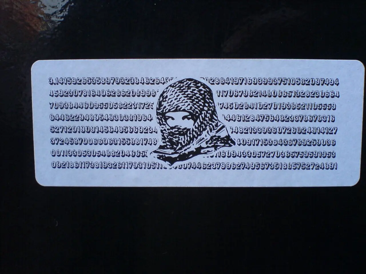 In this image we can see there a board with some code and person in middle with scarf.