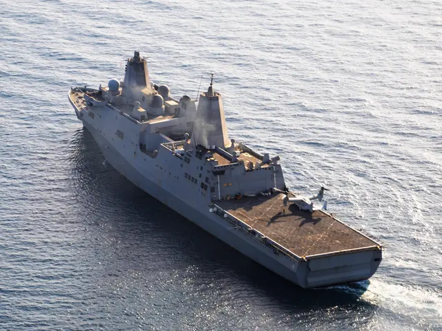 There is water. Also there is a ship moving in the water.