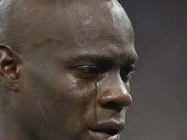 In this image we can see a face of a person.