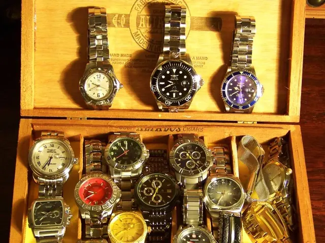 In the picture I can see box, inside the we can see few watches.