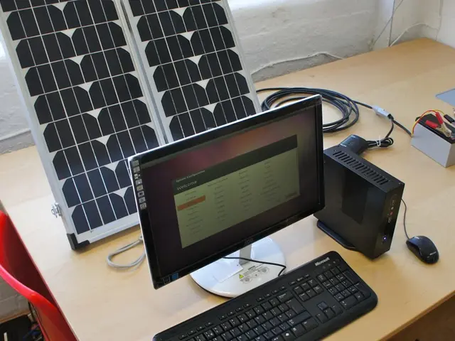In this image I can see a system,keyboard,mouse and a CPU. There is solar panel. There is battery...