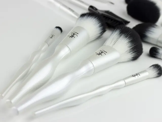 In this picture I can see a number of cosmetic brushes.